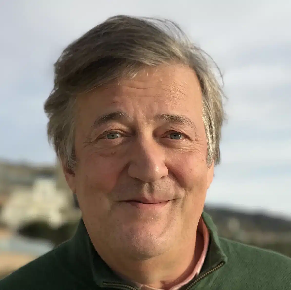 Close up of actor Stephen fry smiling kindly